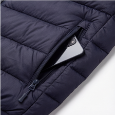 Cierre YKK + bolsillos con cremallera