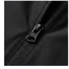 Cierre frontal + bolsillos con cremallera