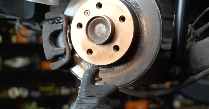 How to remove OPEL ZAFIRA 2.2 16V (F75) 2003 Brake Pads - online easy-to-follow instructions
