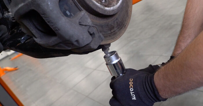 How to remove MINI MINI 1.4 One D 2005 Shock Absorber - online easy-to-follow instructions