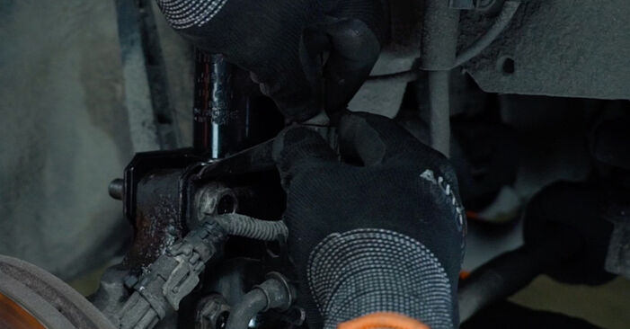 Wie kompliziert ist es, selbst zu reparieren: Stoßdämpfer am Opel Zafira A 2.0 OPC (F75) 2005 ersetzen – Laden Sie sich illustrierte Wegleitungen herunter