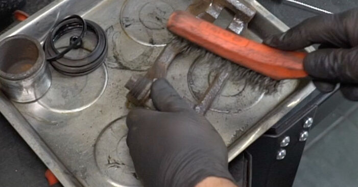 Wie schmierig ist es, selber zu reparieren: Bremssattel Reparatursatz beim Mercedes W201 E 2.3 (201.028) 1988 wechseln – Downloaden Sie sich Bildanleitungen