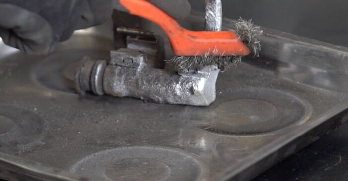 Como remover PEUGEOT 206 1.6 16V 2002 Discos de Travão - instruções online fáceis de seguir