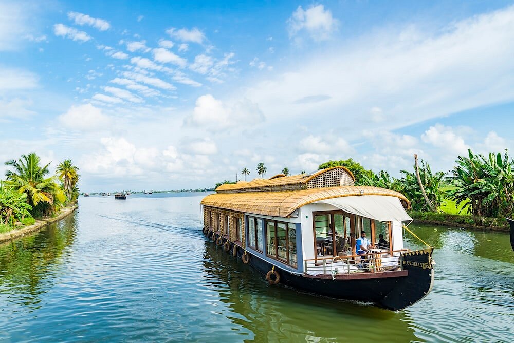 Alleppey backwaters with traditional Kerala houseboat
