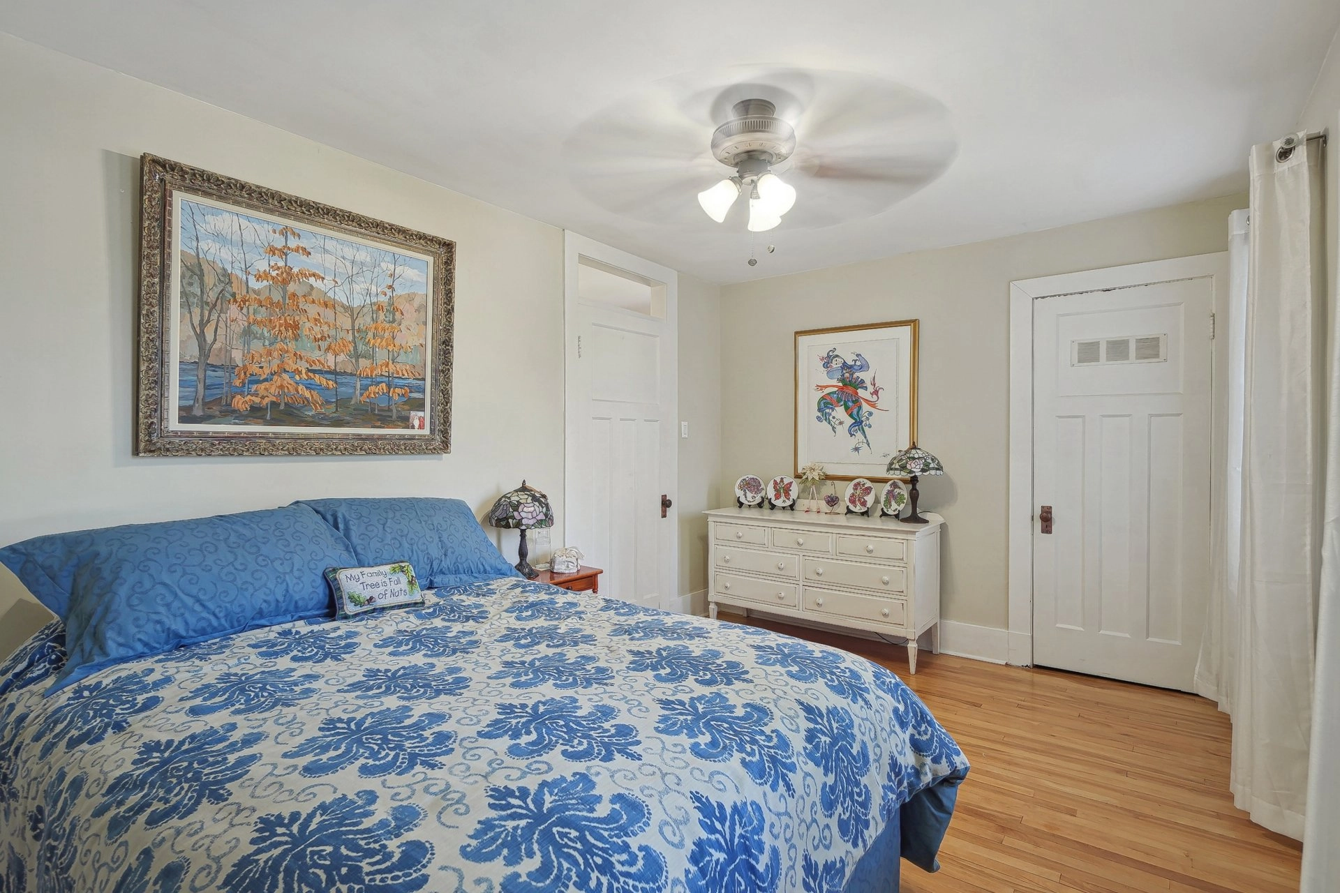 Cozy bedroom with hardwood flooring