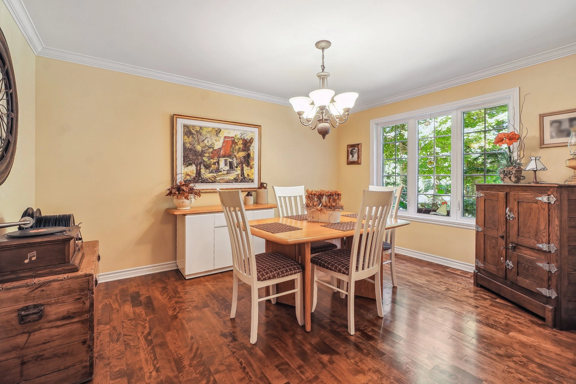 Dining room with neutral walls and large window