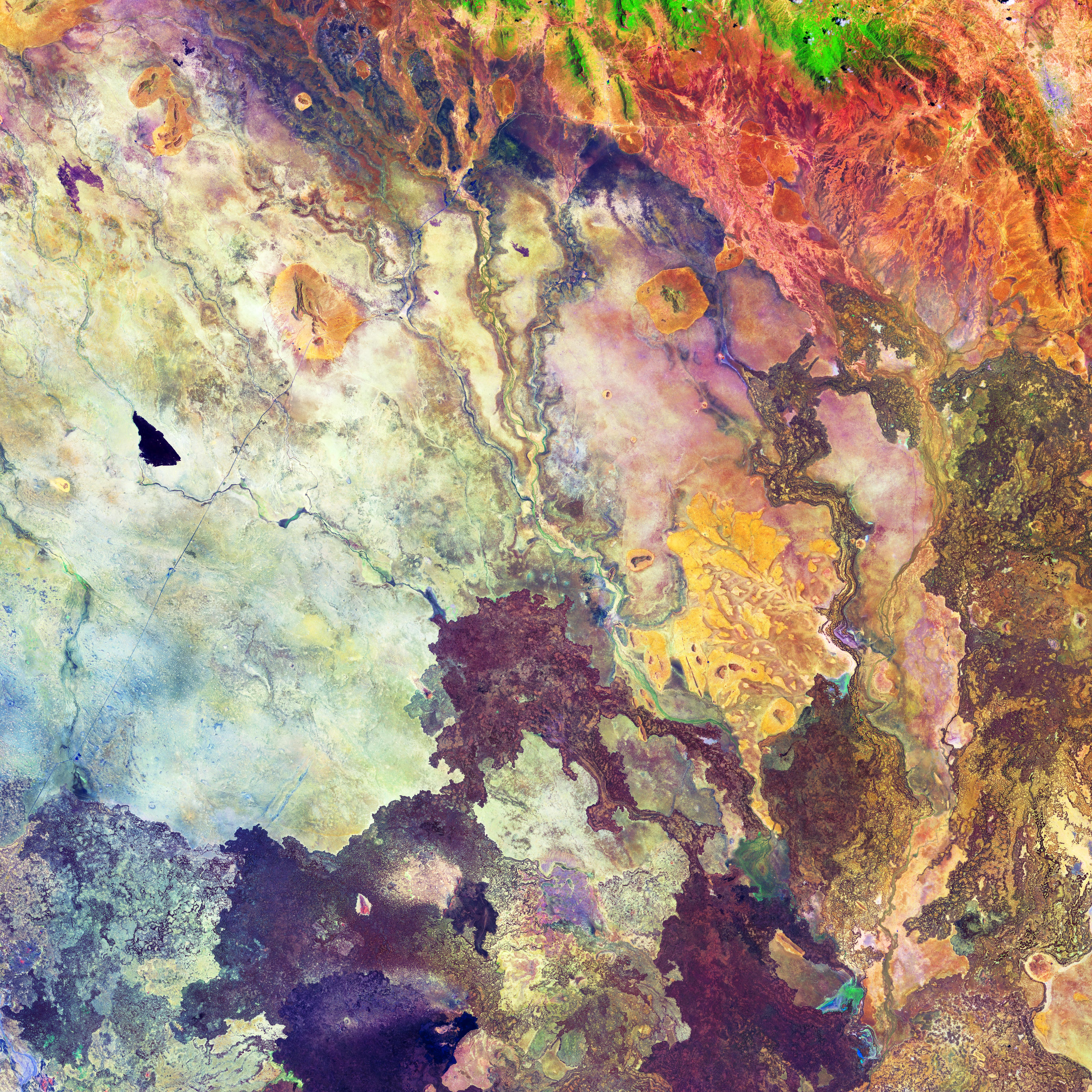 Das Bild zeigt eine felsige Landschaft in zahlreichen bunten Farben.
