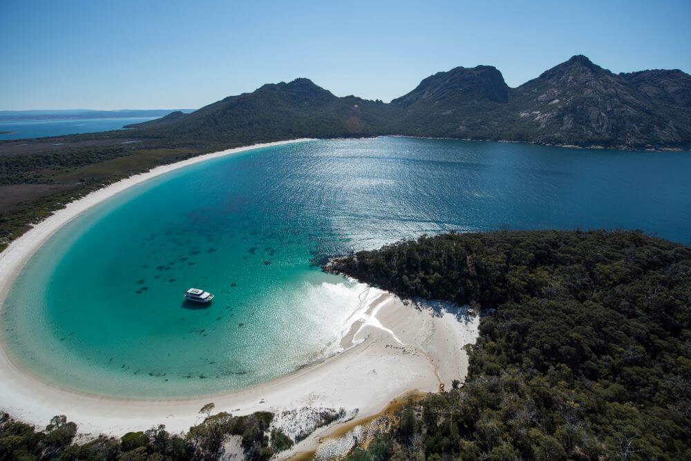 Tasmania Road Trip: Diverse landscapes, historic sites, and charming accommodations along the east coast.
