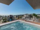 KRE_ESS_-Living-do-apartamento-cobertura_EF-scaled.webp