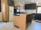 Cobertura Comune di Belluno - Praia de Palmas - Cozinha.jpg