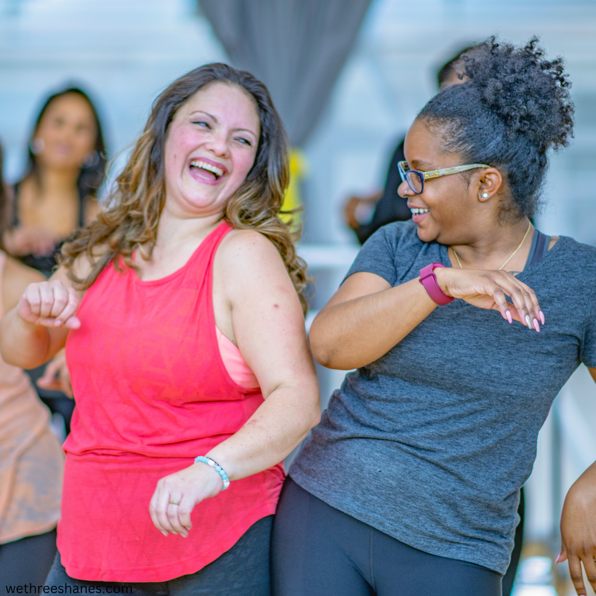 women having fun together in a dance fitness class