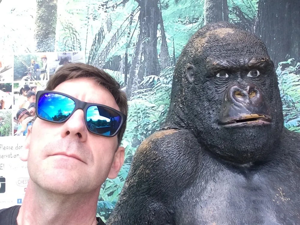 Chris Childs in Ray-bans, beside a (fake) gorilla
