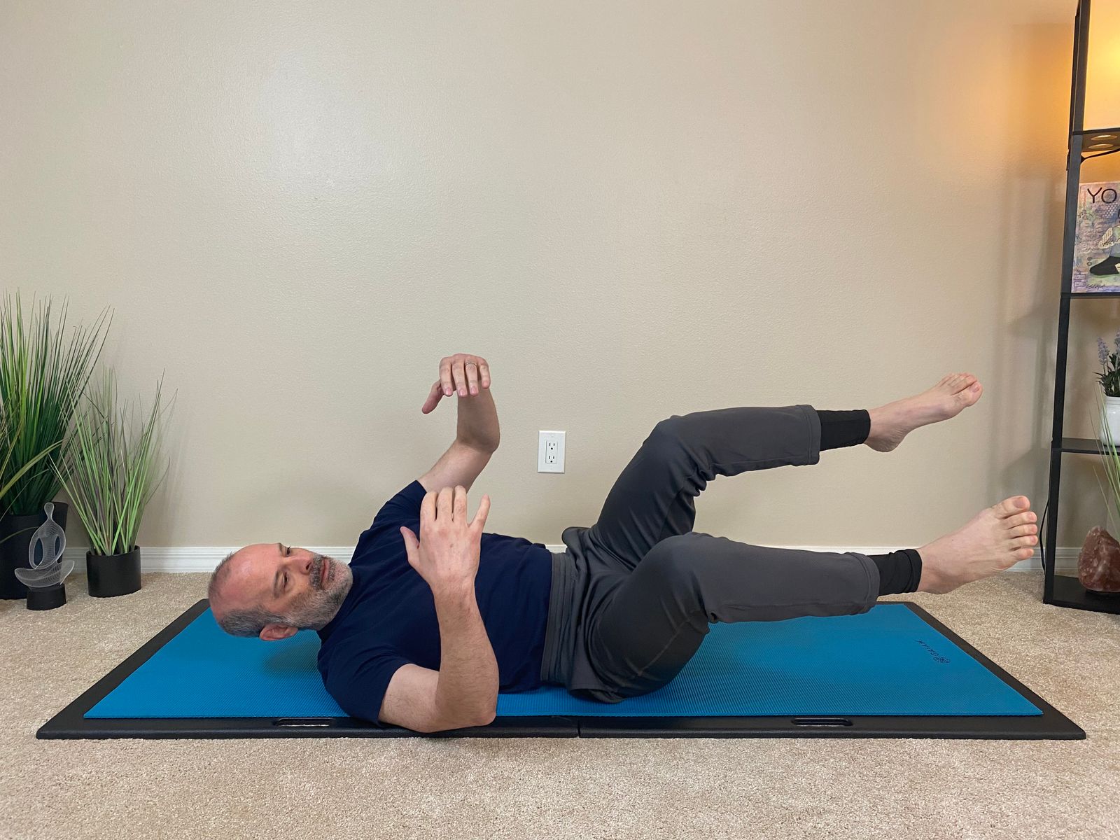 Cross-body rolling pattern to safely get out of bed without back strain