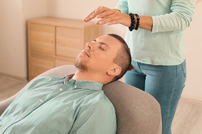 Chair reiki, man reiki, reiki for groups corporate company perk