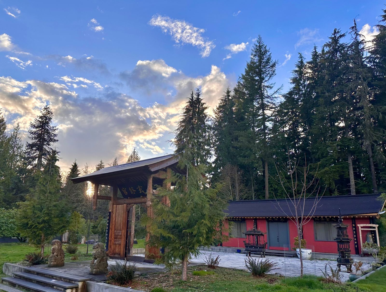 External view of the Daoist temple and front gate and courtyard at Xuan Xiu Gong Taoist Sanctuary and Retreat Center