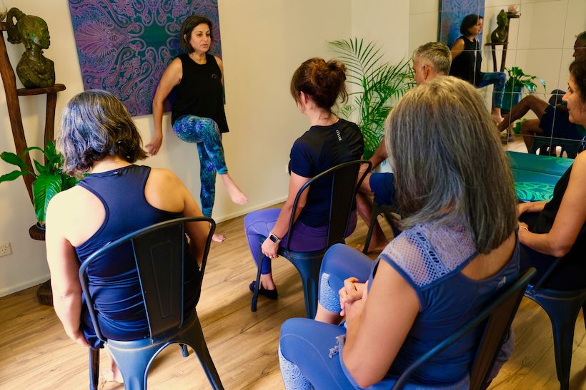 Chair yoga for seniors at EmpowerMe Now Yoga and Pilates