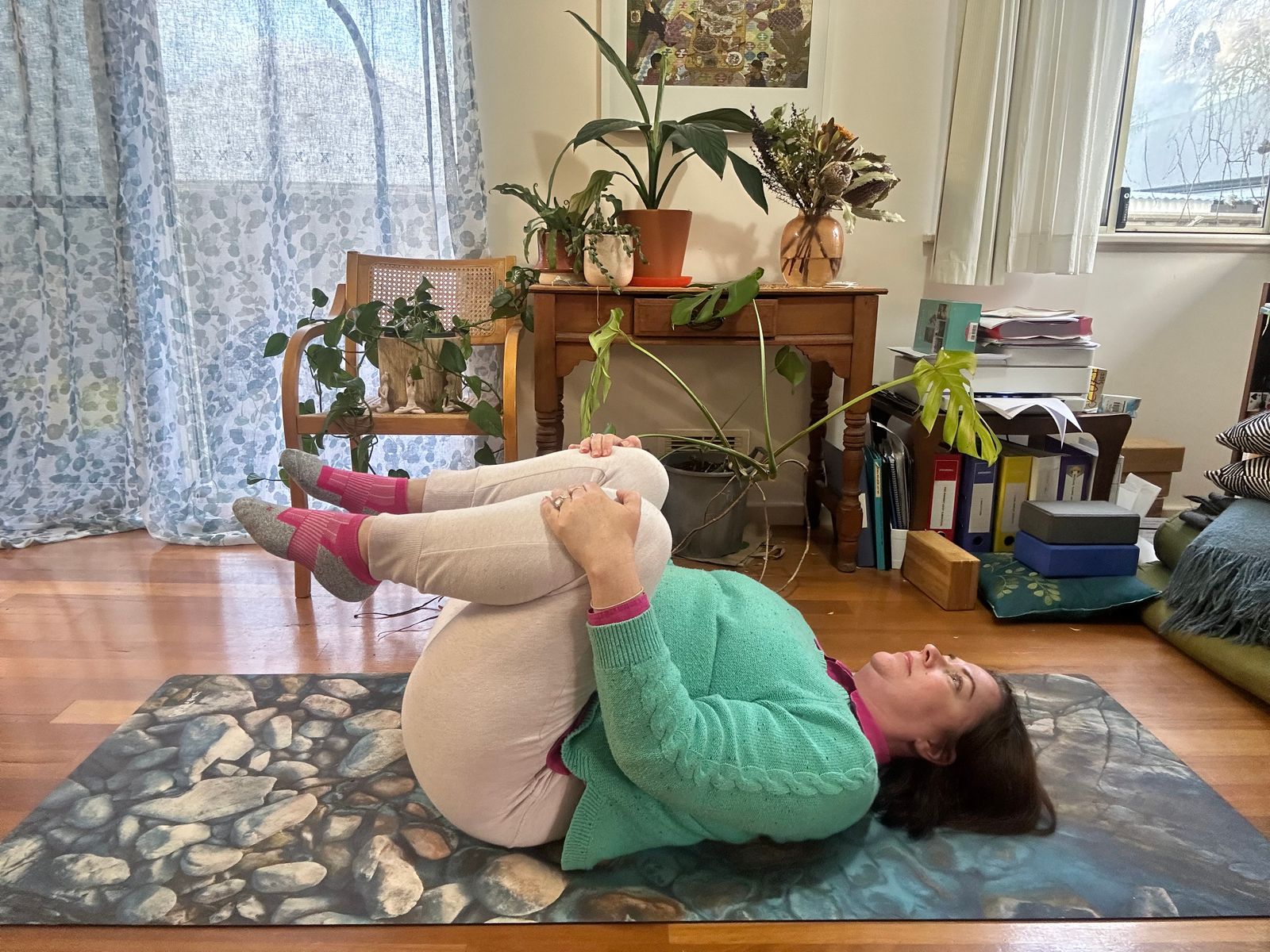 Emma Polette doing yoga at home
