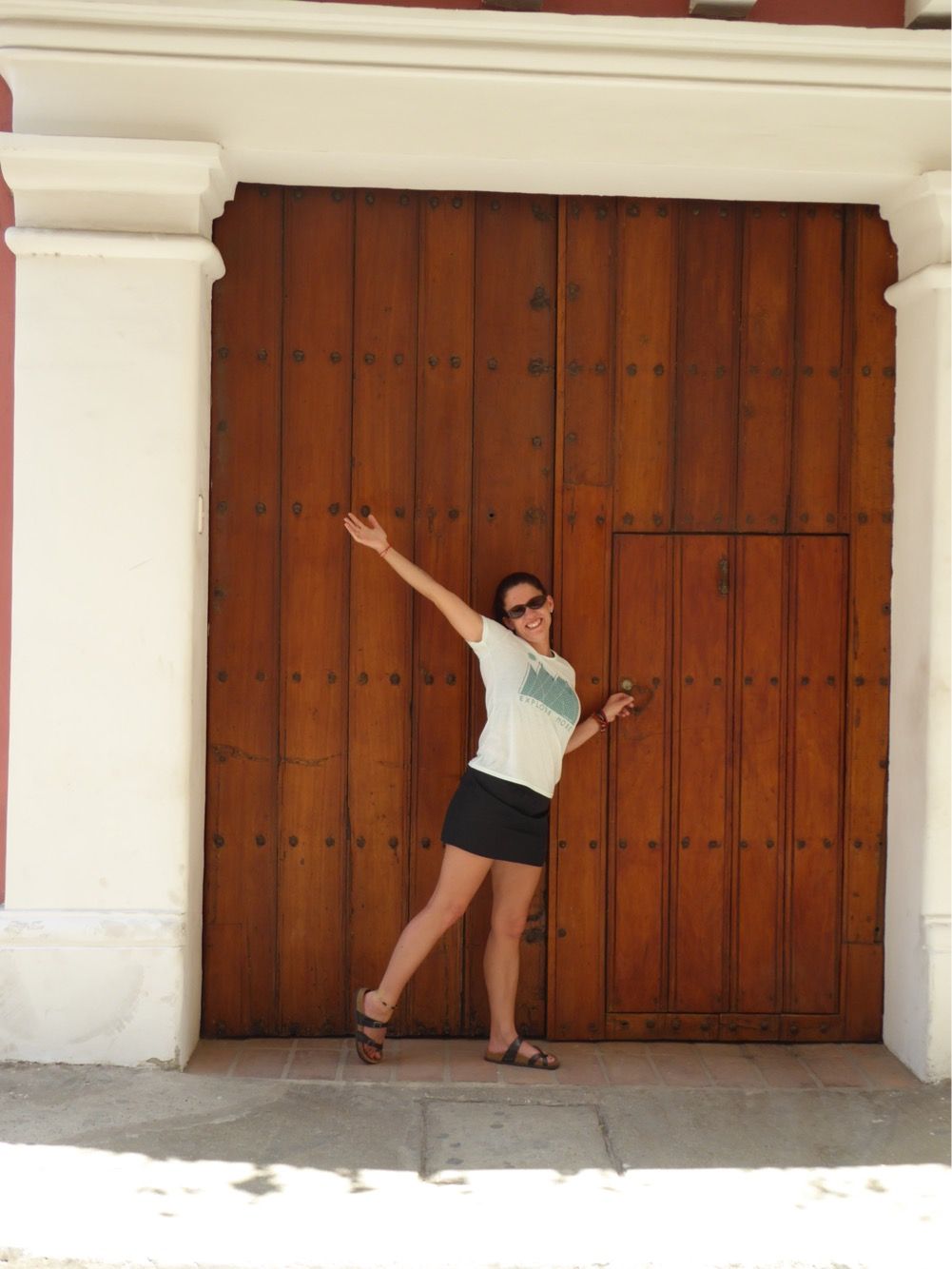 Author of article standing at a threshold doorway in Columbia 