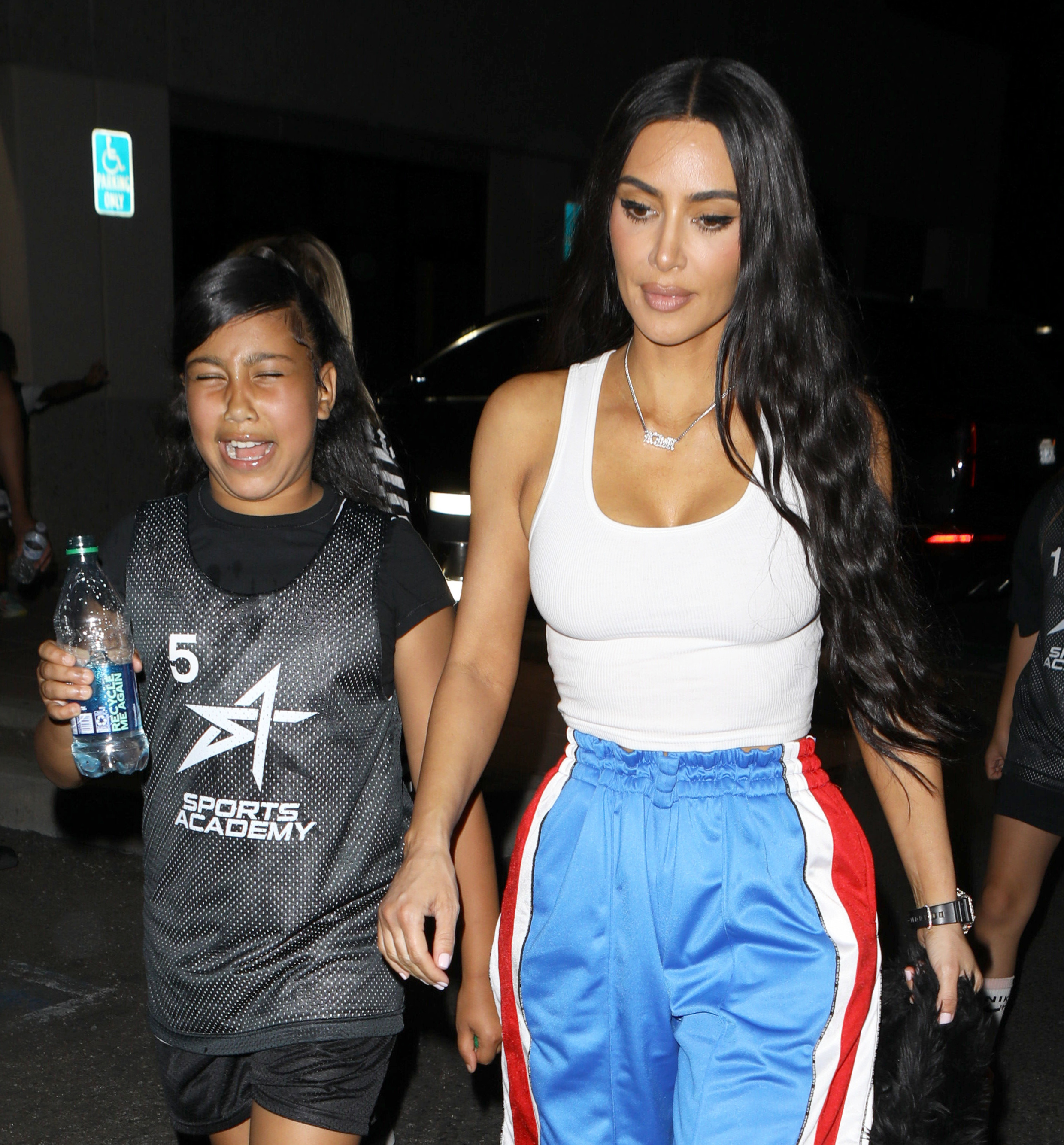 North West left her basketball game with Kim looking just miserable