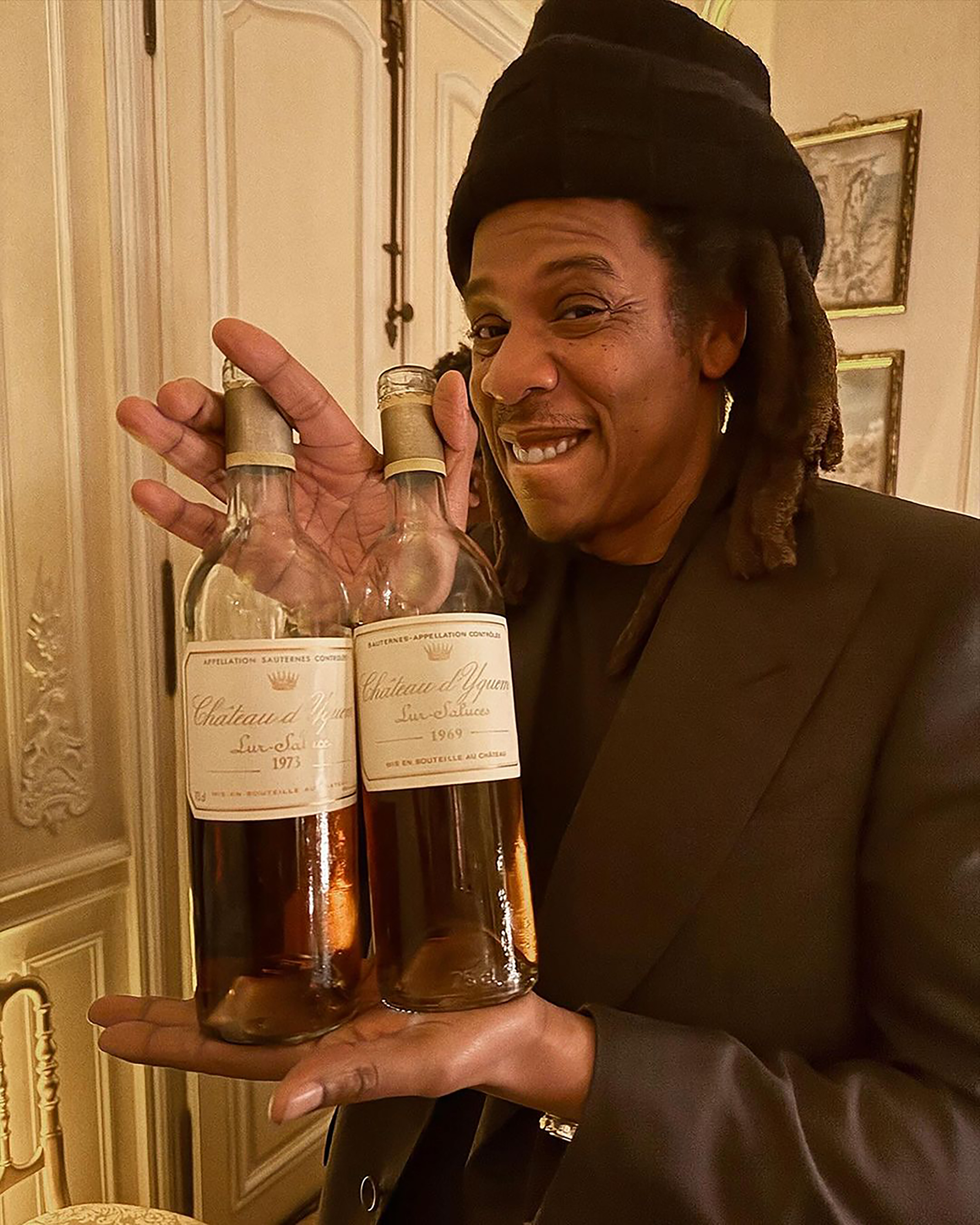 Jay-Z posed next to a 1969 bottle of Château d'Yquem