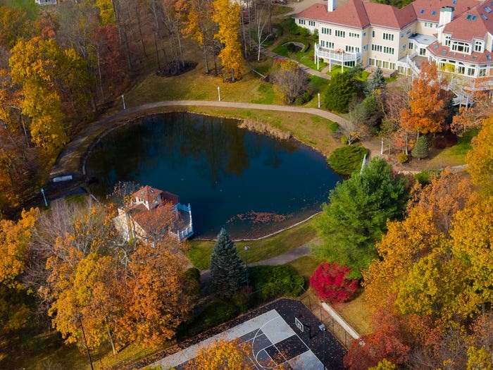  The property also has a pond next to the basketball court