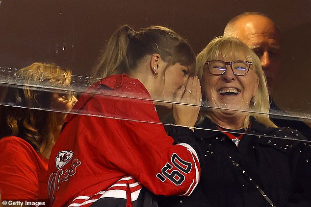 Swift whispers in the ear of Donna Kelce - Travis' mom and her potential future mother-in-law