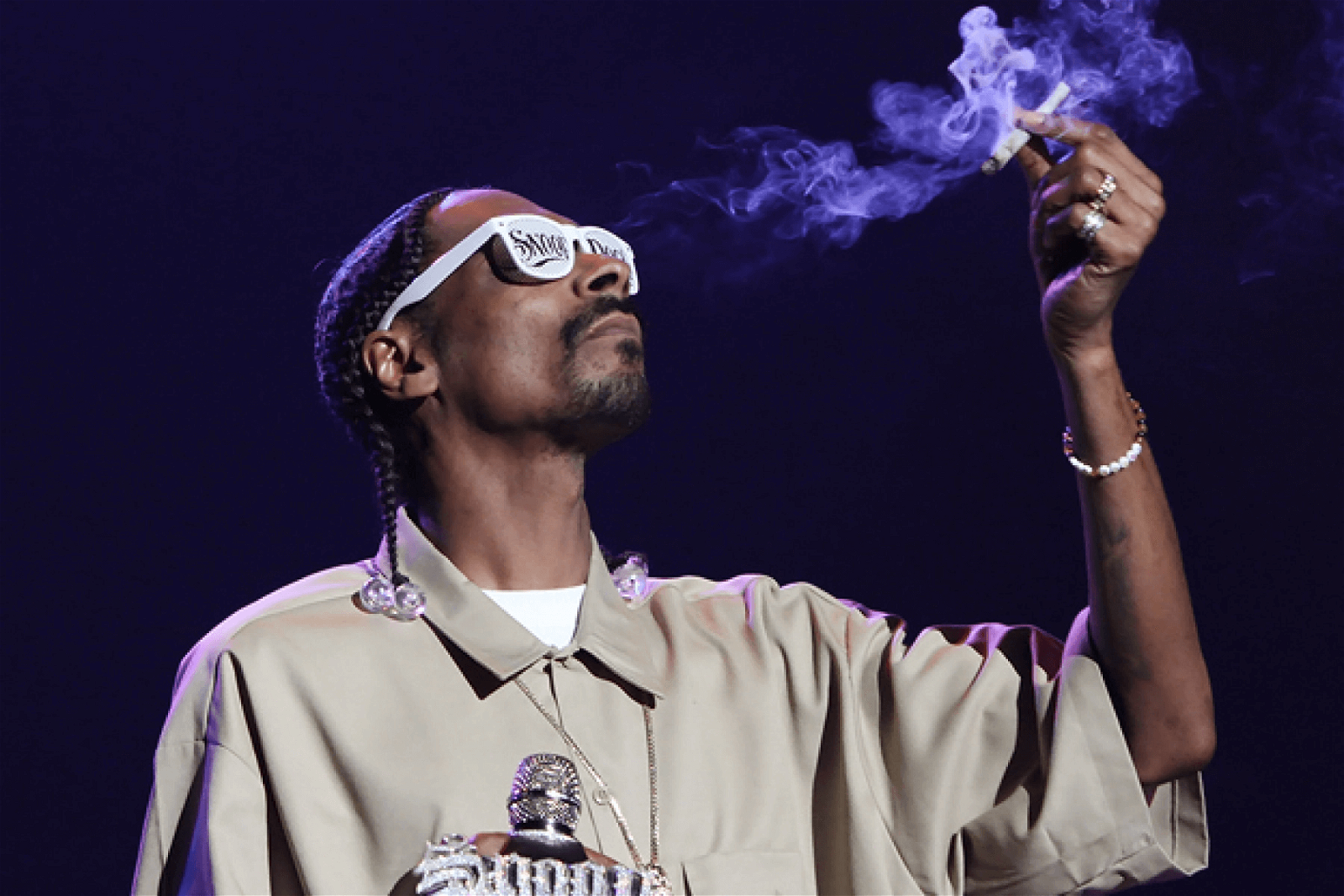 Snoop Dogg smoking another joint