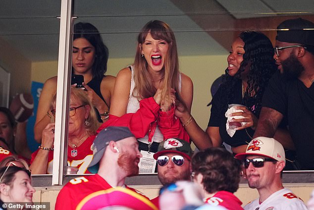 Cheering him on: Earlier, she had joined his mother, Donna Kelce, in cheering him on and watching the Kansas City Chiefs triumph over the Chicago Bears