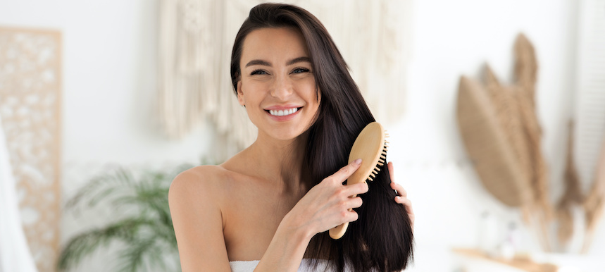 a woman holding a cookie