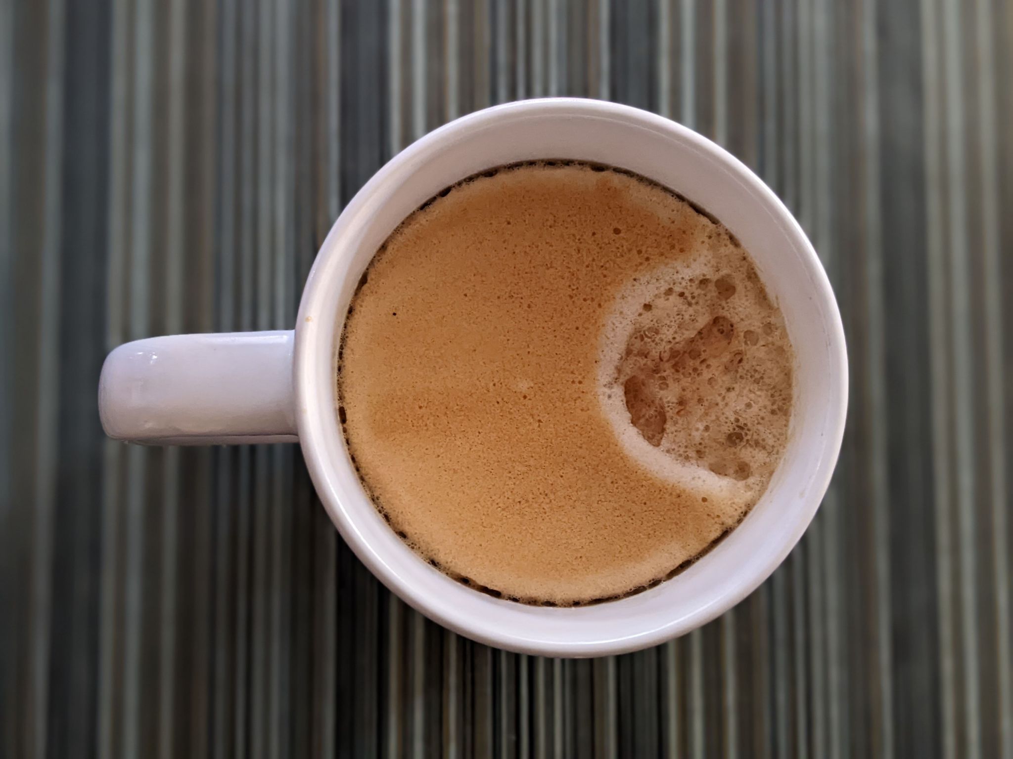 Drinking coffee after having cold oats for breakfast for the first time.  I like donuts better, but at least oats are healthy.