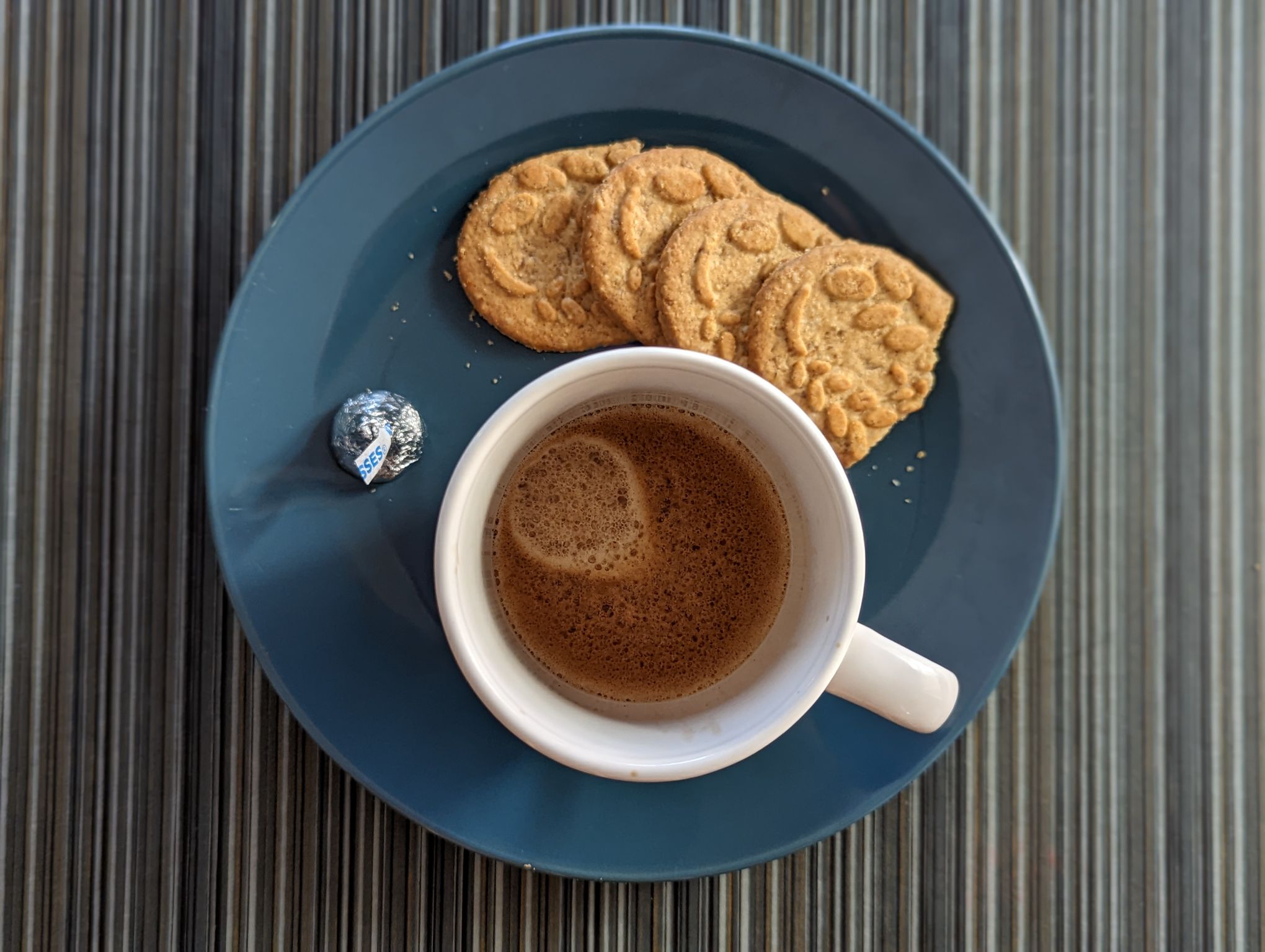 I used to drink this coffee from a single serve French press.  I liked the taste, but I've also been enjoying it as a double espresso using a refilled Nespresso Vertuo capsule.  It's even better when paired with something.  I added a single Hershey kiss for good measure.