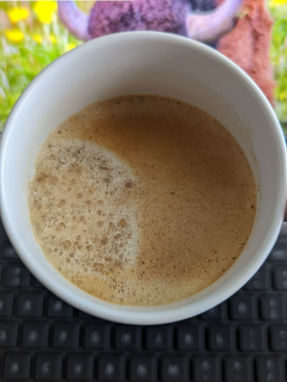 Drinking some hot coffee on a hot summer day.  

Nice smell of hazelnut and a little sweet