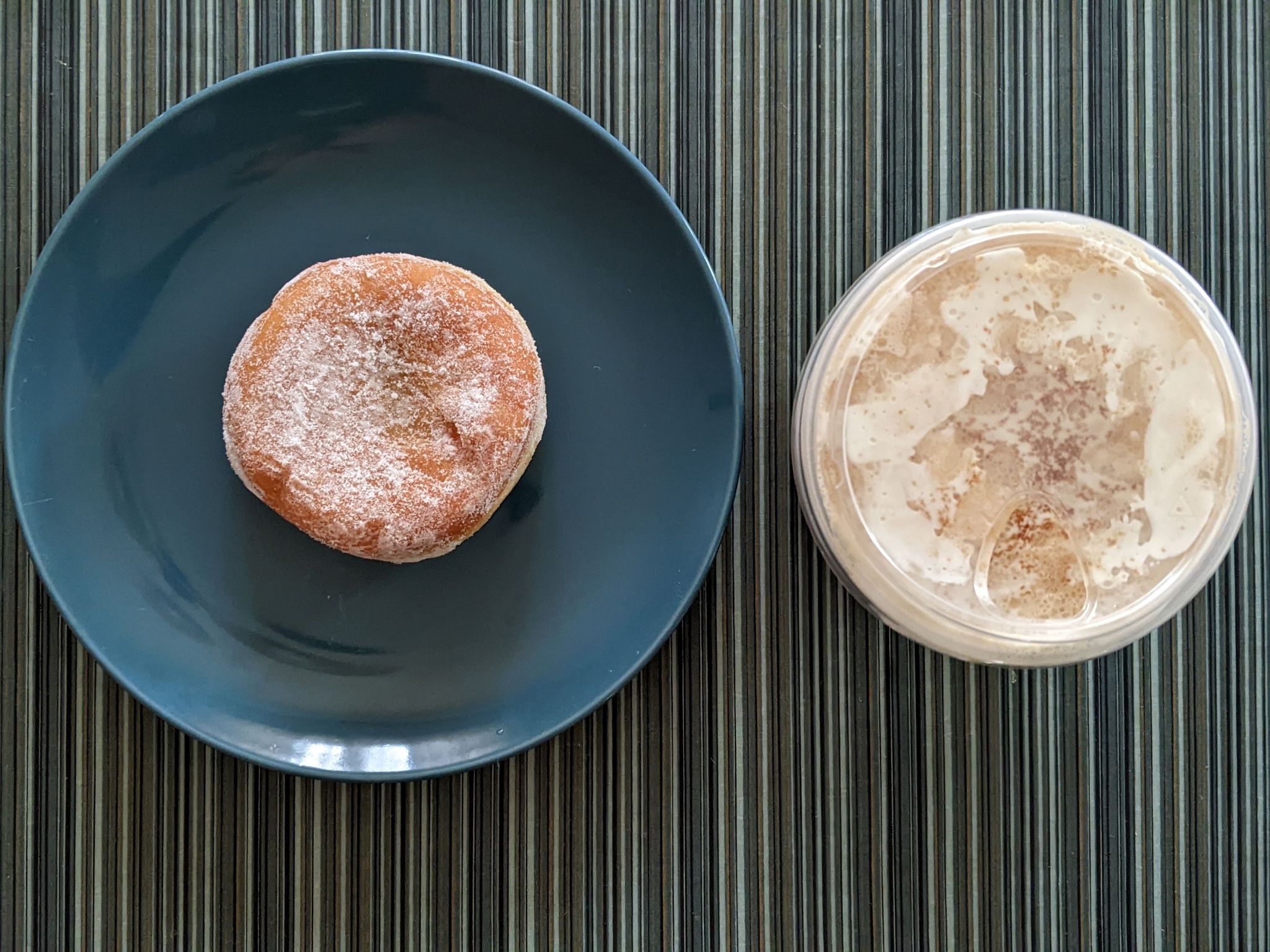 Having another pistachio cold cream with salted brown butter nitro cold brew but with a jelly donut from Dunkin