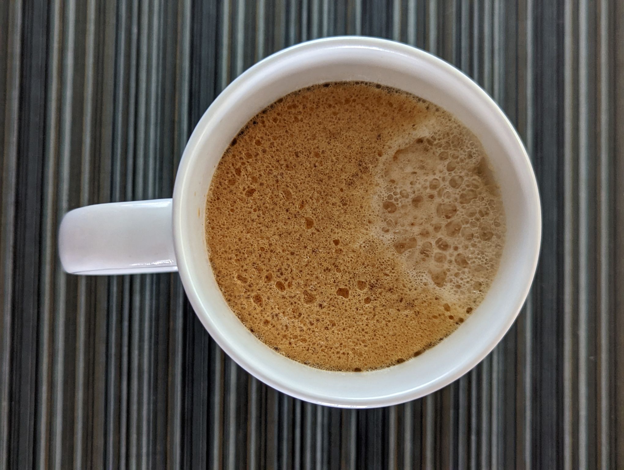 Enjoying a coffee on this sunny and warm Friday.  Tomorrow I'll be trying a new coffee from Tree House.

Medium fine grind in refilled Nespresso Vertuo capsule