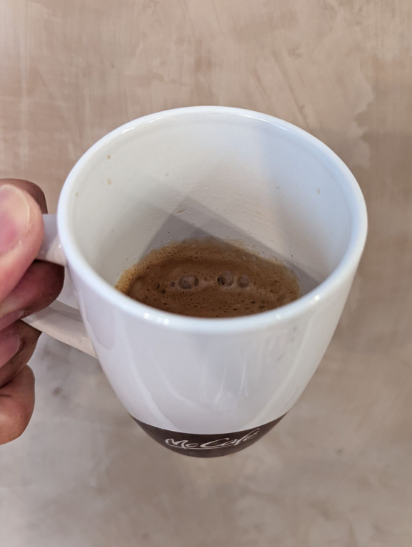 Caffeine on a hot afternoon.

Medium fine grind in refilled Nespresso Vertuo capsule