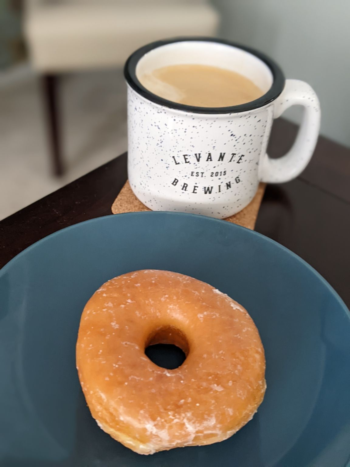 Enjoying a donut and coffee during a meeting :)