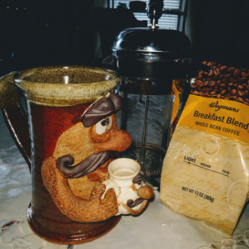  My favorite coffee mug. Have had this for 30+ years. One of 100+ in my collection. .Holds a quart.

 An engineer once asked what the white mug was for.  I replied, 