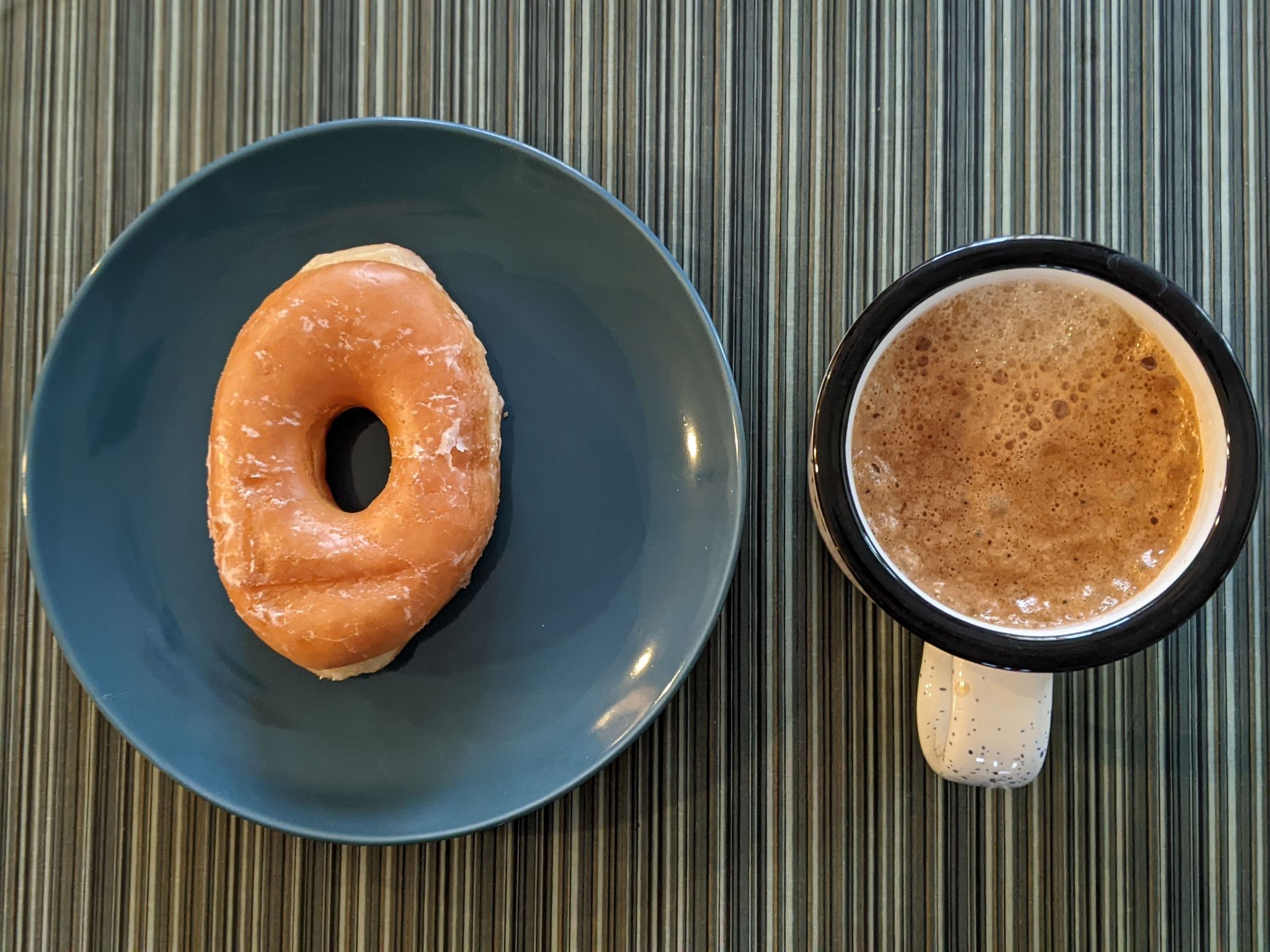 Peanut butter chocolate coffee pairs well with a glazed Dunkin donut.