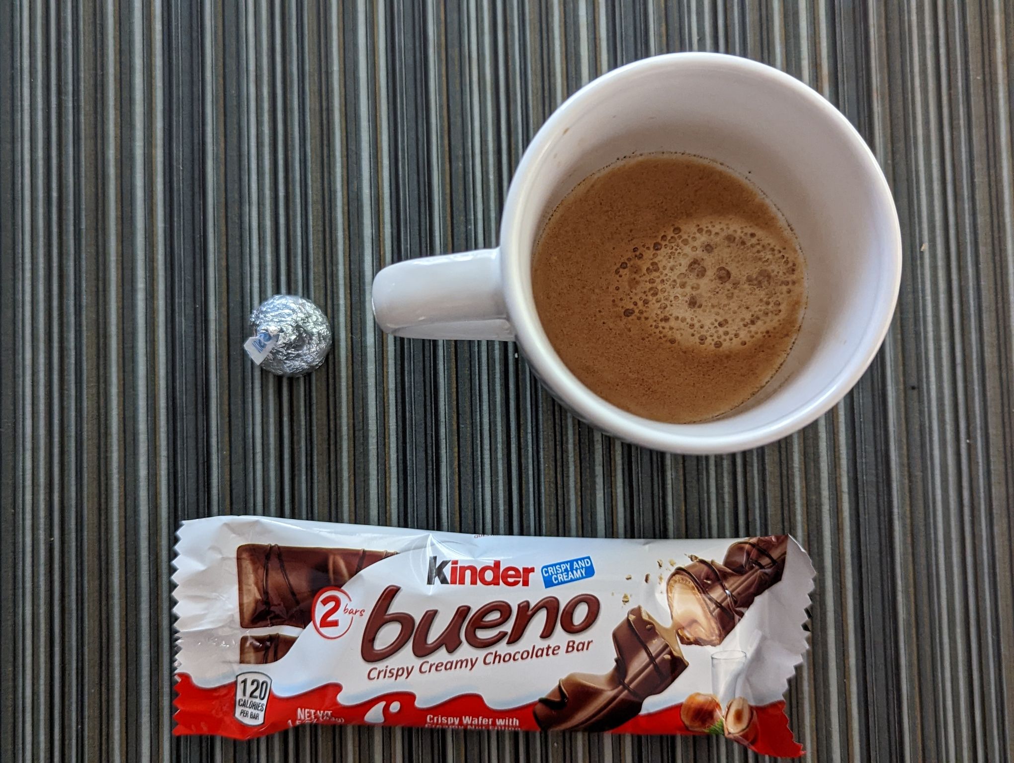 I remember last Thursday when I just had Hershey's chocolate with my coffee.  What should it be this week: Hershey or Kinder?