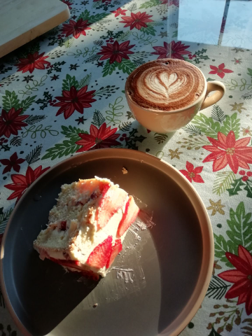 With a good piece of strawberry cake