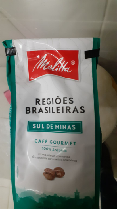 Café com notas de chocolate, não tão ácido.