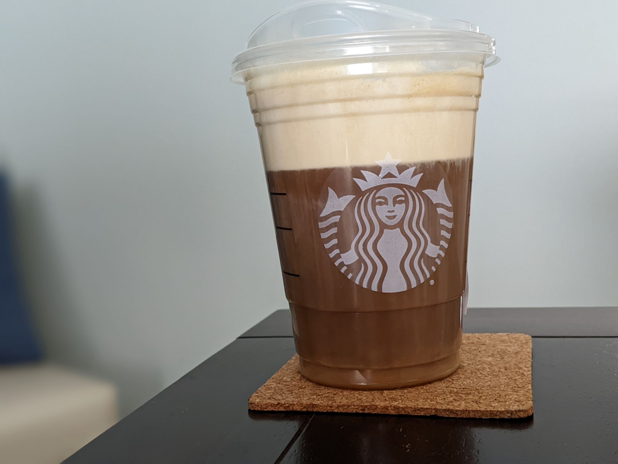 Enjoying a pistachio cold cream with brown butter topping nitro cold brew on a cold Saturday morning