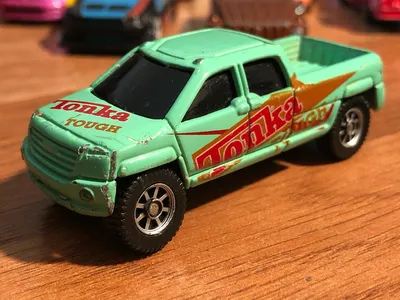 My daughters trucks.  Maisto,Tonka 2000 GMC Terradyne Orange one is a Matchbox version#diecast #diecastpics #diecastphot