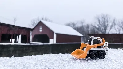 Getting started pushing snow. #matchbox #matchboxoffroad #matchboxskidster #skidster #diecastphotography #diecastoffroad