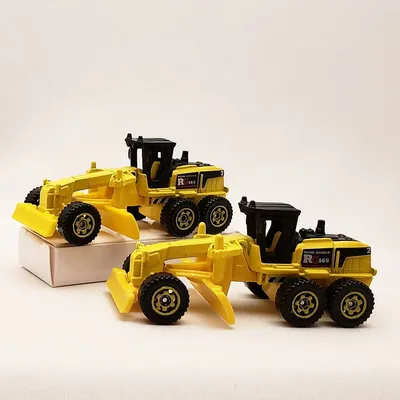 Matchbox's 2018 release of the Ground Grinder is virtually identical to the 2013 release.  The black tampa is less gloss
