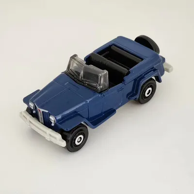 2024 Matchbox No. 10/100 is the 1948 Willys Jeepster in navy blue.This vintage Jeep is plain and simple. A nice shade of