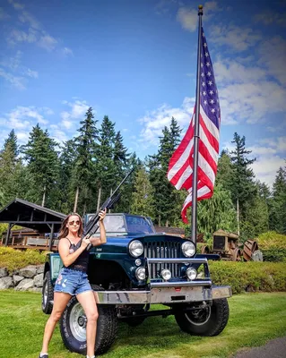 When your bro's wife holds your big long gun.. sometimes I borrow his toys, oh and there's his new 1948 Willys Jeepster.
