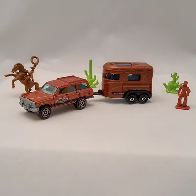 2022 Matchbox Hitch & Haul - MBX Rodeo The Jeep Wagoneer is accompanied by the Pony Trailer along with a couple of cowbo