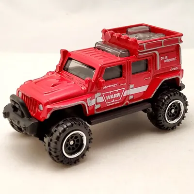 2023 Matchbox No. 42 of 100 - Jeep Wrangler SuperliftThe Superlift is in eye catching red with white and silver-grey dec