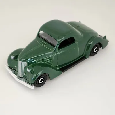 2024 Matchbox No. 62/100 is the 1936 Ford Coupe.This dark green colour suits this classic car nicely. We've previously s